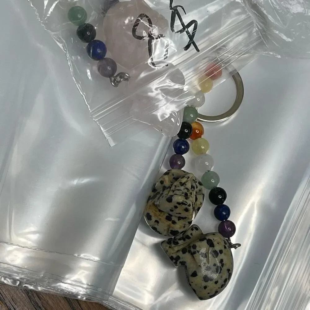 Dalmatian jasper skull carving key chain key ring 7 chakra beads rainbow